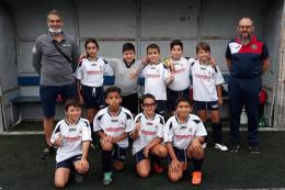 I giocatori del Barcanova 2011 e l'istruttore Christian Anelli: «Una vita, due sport»